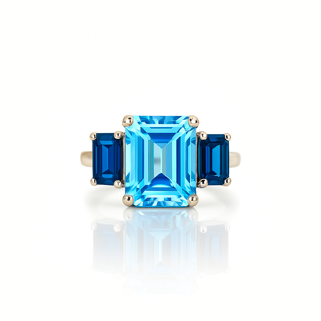 Three Blue Topaz Emerald-Cuts White Gold Ring