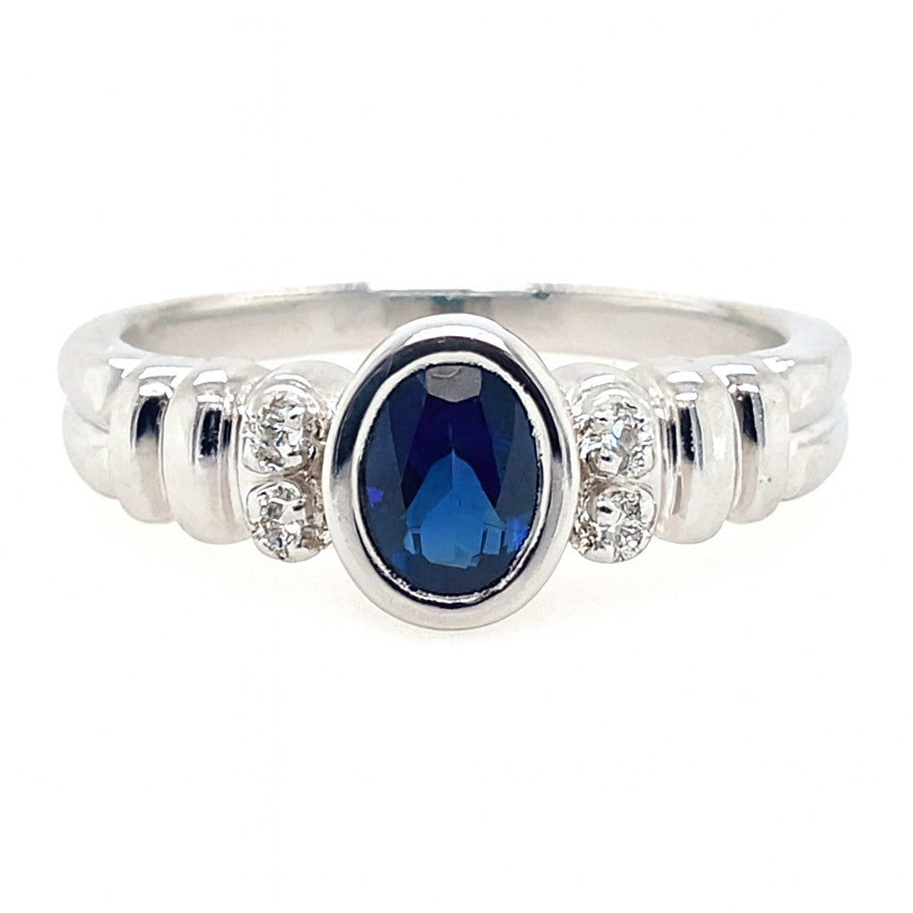 Deep Blue Oval Cut Birthstone Ring