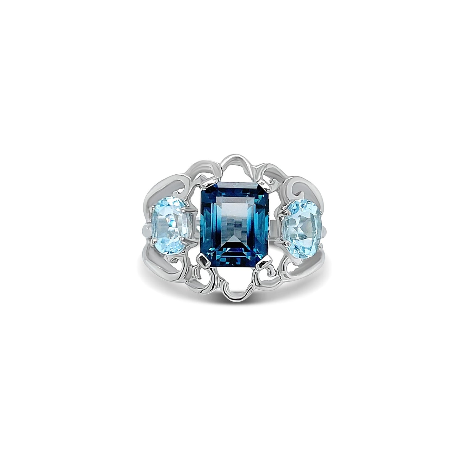 Three Blue Topaz Emerald and Oval-Cut Birthstone Ring