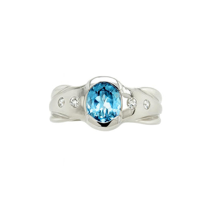 Blue Topaz Oval-Cut Birthstone Gold Ring