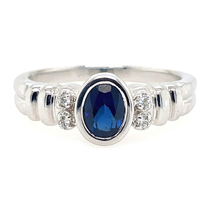 Deep Blue Oval Cut Birthstone Ring